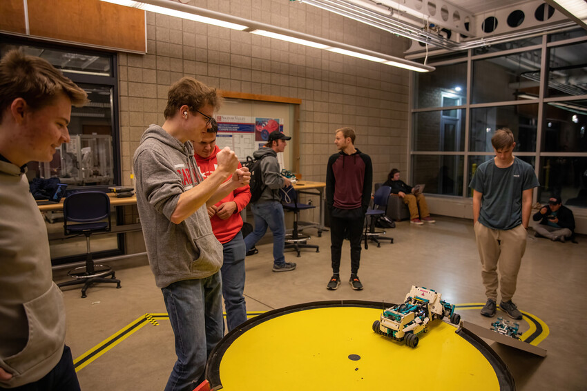 Students test robotic vehicle.